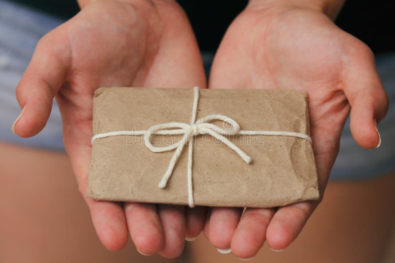 Premium Photo  Closeup on mature hands exchanging a christmas