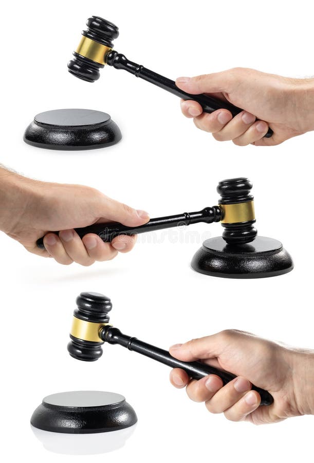 Hand hold judges gavel on sounding block on white background stock photo