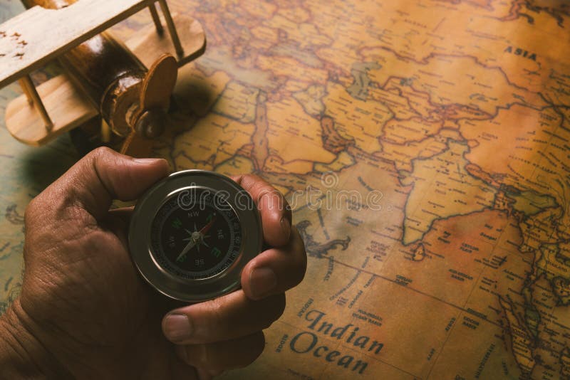 Hand Holding Compass. Online Booking Stock Image - Image of holiday, money:  153857823