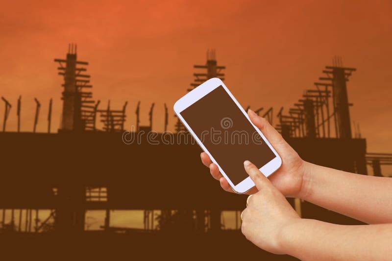 Hand Hold and Touch Screen To Take a Photo with Silhouette Construction