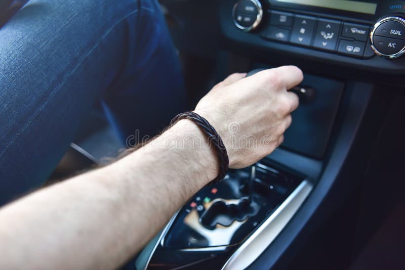 Hand Holding Automatic Transmission in Car Stock Photo Image of black