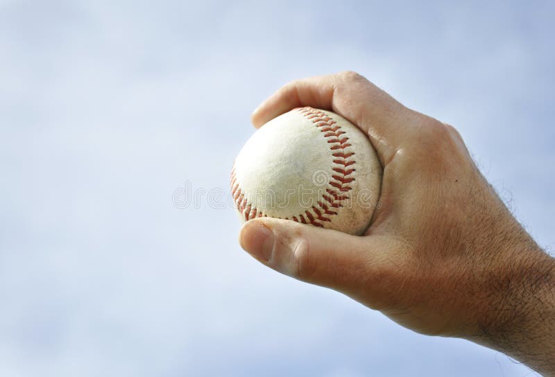 Hand holding a baseball stock image. Image of ball, hardball 24082363