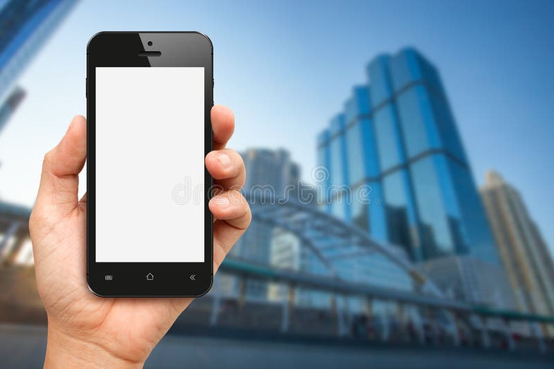 Hand holding blank screen smart phone with office buiding stock photos Hand holding blank screen smart phone with office buiding stock photos