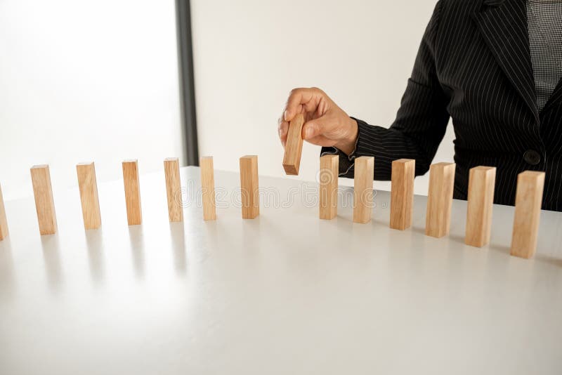 Hand Holding Blocks Wood Game, Concept Risk Of Management And Strategy Plan, Growth Business Success Process And Team Work