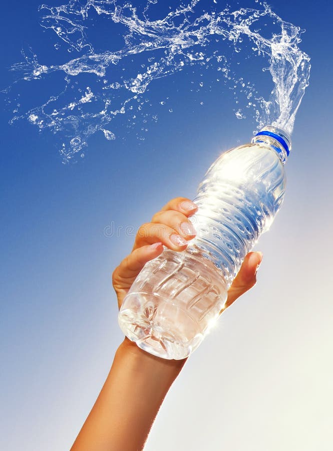 Hand holding a bottle of water