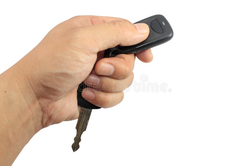 Hand holding car keys stock image