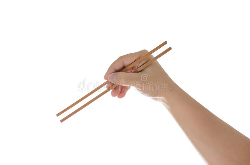 Hand holding chopsticks, isolated on white royalty free stock photography