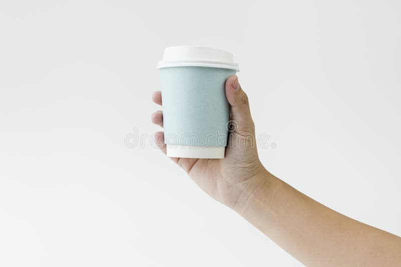 Hand holding coffee cup mockup blank isolated background