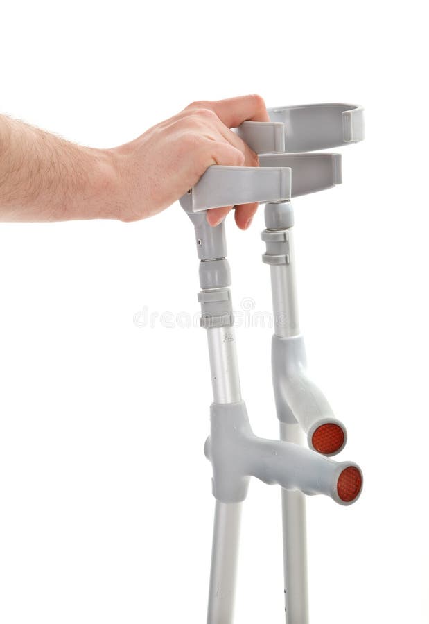 Hand holding crutches stock image. Image of impairment 9403017
