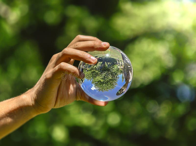 Hand holding crystal ball stock photo. Image of holding 203612852