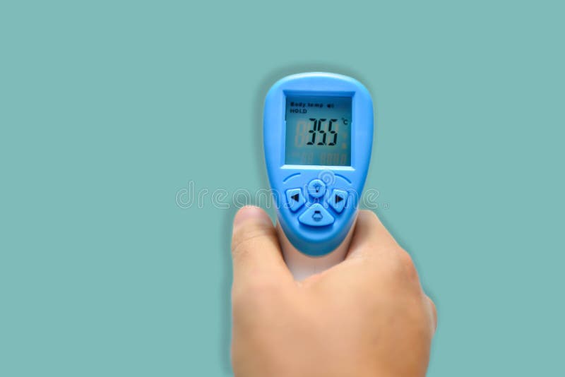 Hand Holding Digital Infrared Thermometer Thermometer Gun Stock Photo
