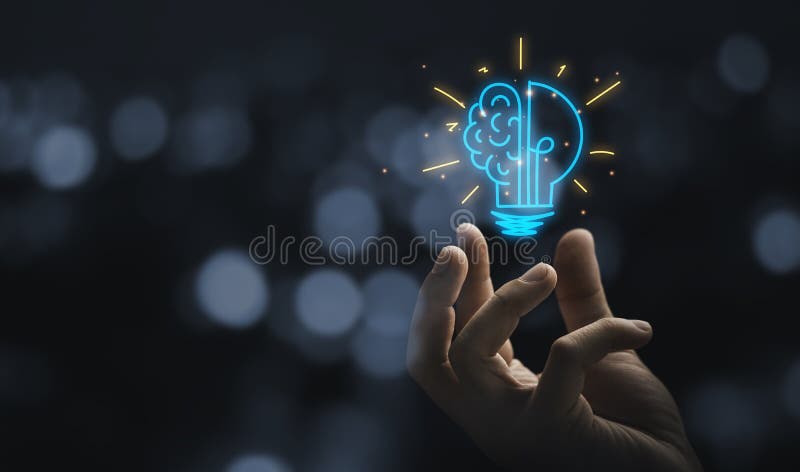 Hand holding drawing virtual lightbulb with brain on bokeh background for creative and smart thinking idea concep royalty free stock photo