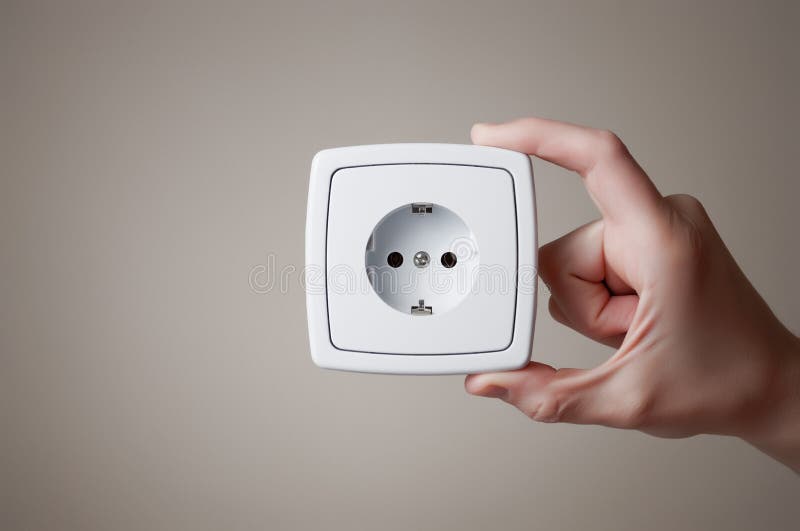 Hand with electric outlet royalty free stock photo