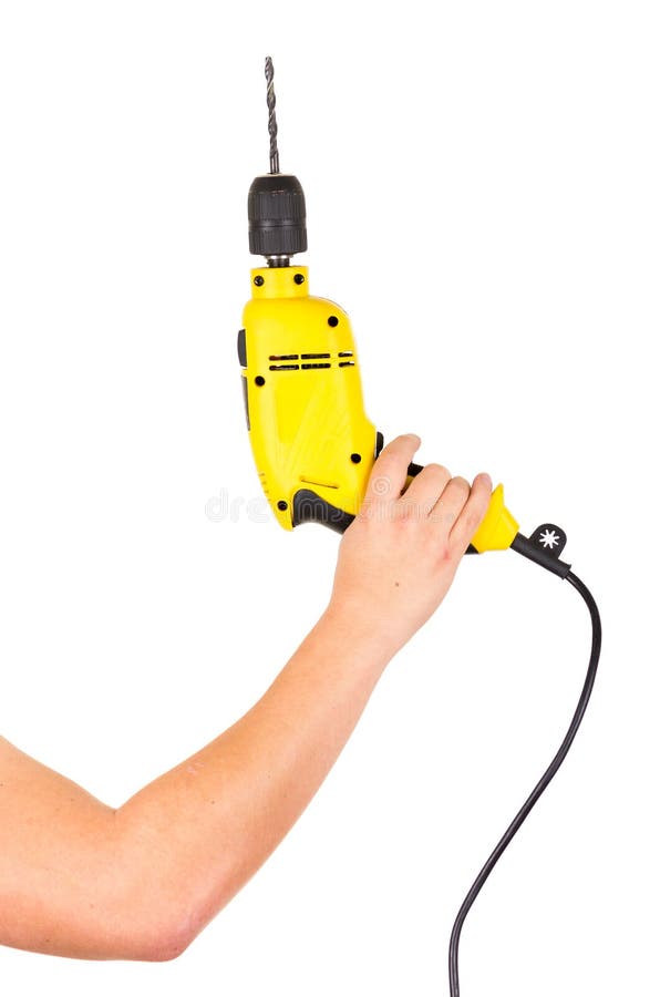 Hand holding electric yellow drill tool royalty free stock photos