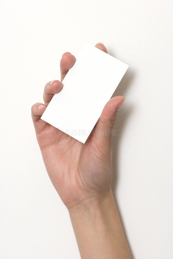 Hand holding an empty business card