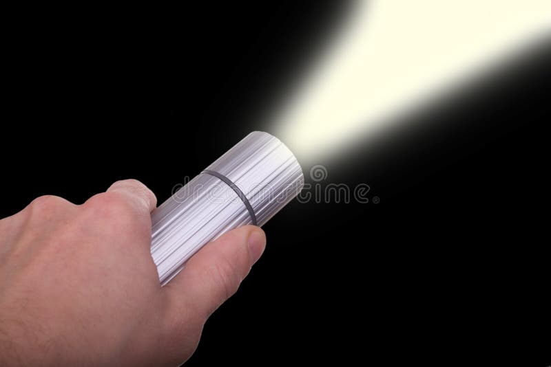 Hand holding flashlight