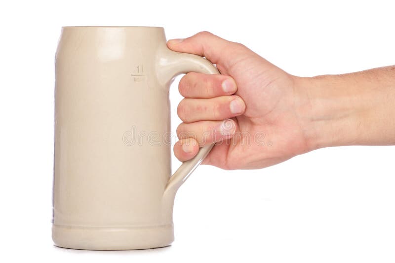 Hand holding german Beer Stein Mug