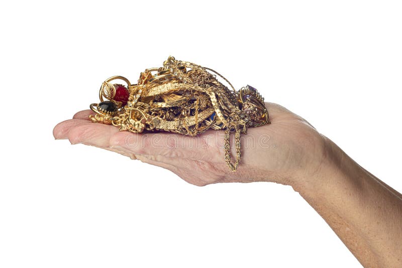 Hand Holding Gold Jewelry Isolated On White stock image Hand Holding Gold Jewelry Isolated On White stock image