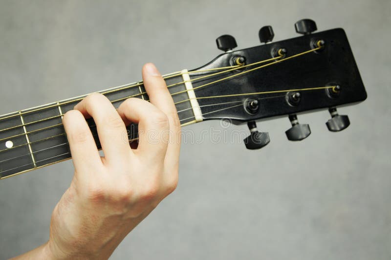 Hand holding guitar stock image. Image of string, instrument 22497511