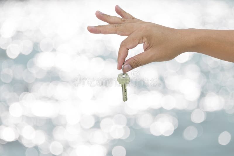 Hand holding key stock image. Image of body, equipment 71598135