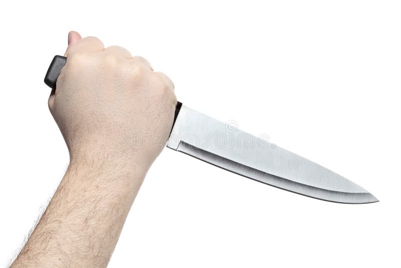 Hand holding a knife. 