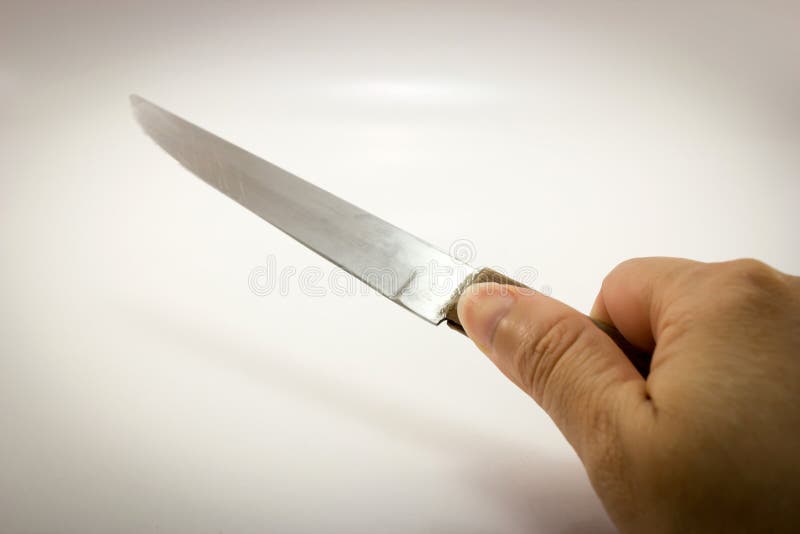 Hand holding knife. stock photo. Image of knife, tool 46924694