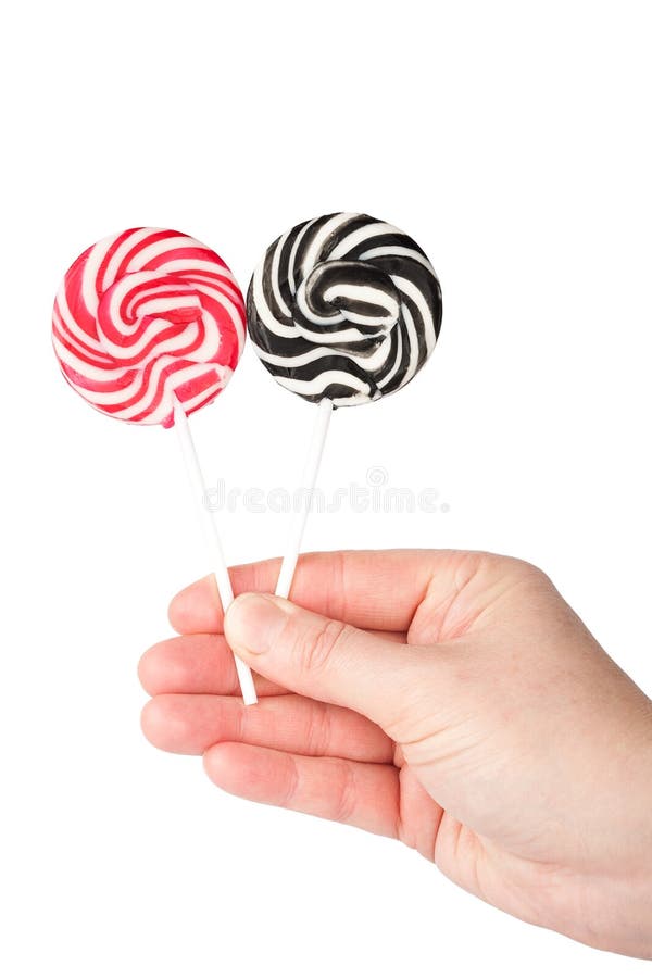 Hand holding lollipops stock photo. Image of color, object - 27459838