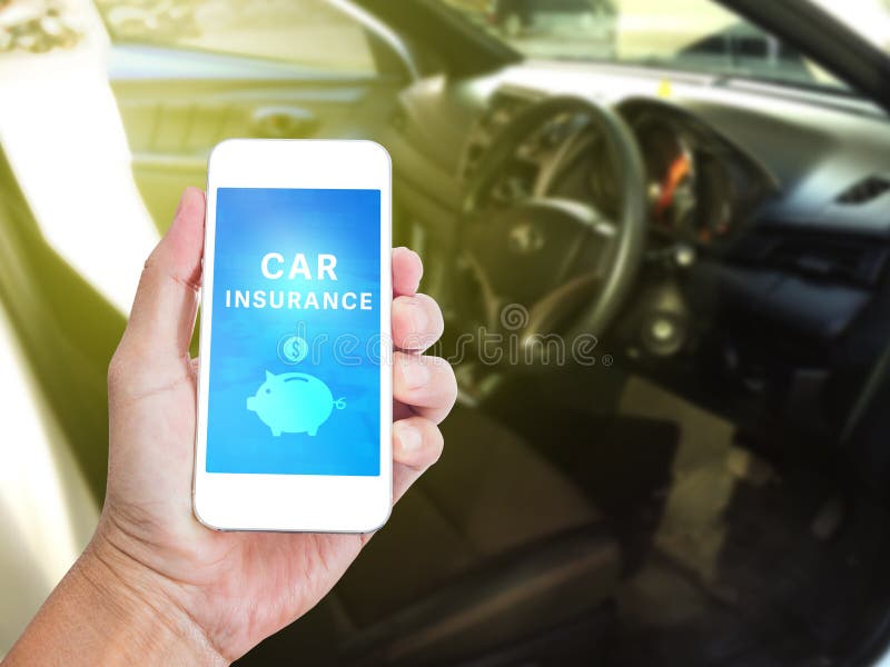 Hand holding mobile phone with Car insurance word