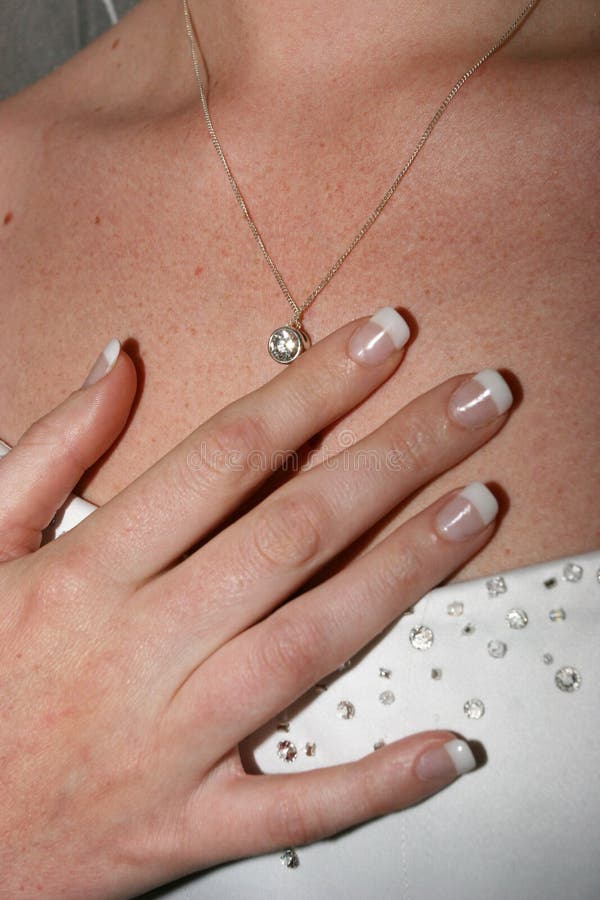 Hand holding necklace stock photo. Image of bride, clothing 319204