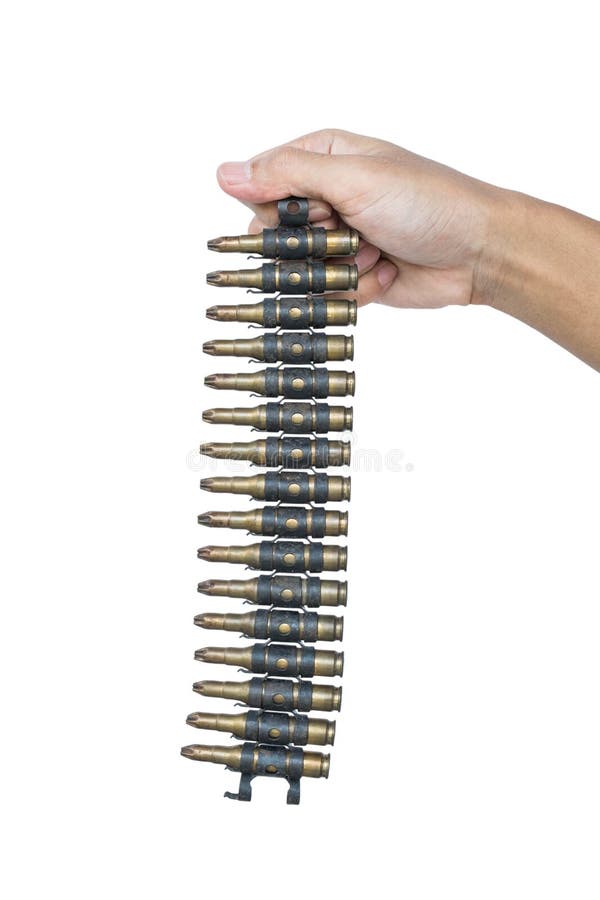 Hand holding pack of machine gun bullets