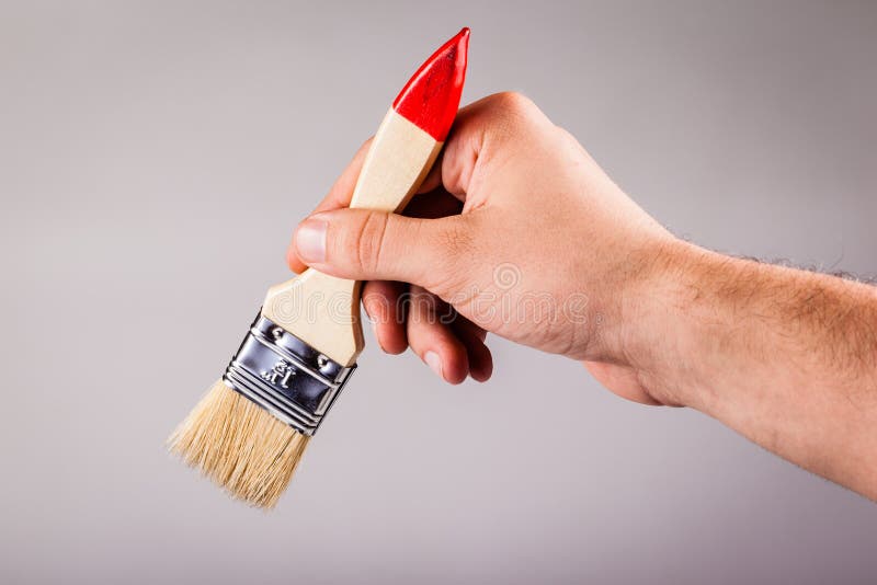 Male Hand Holding a Paintbrush Stock Image Image of clean, painter