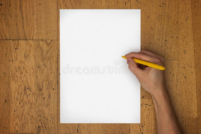 Hand Holding Pen on Blank Paper Sheet on a Table Stock Photo - Image of ...