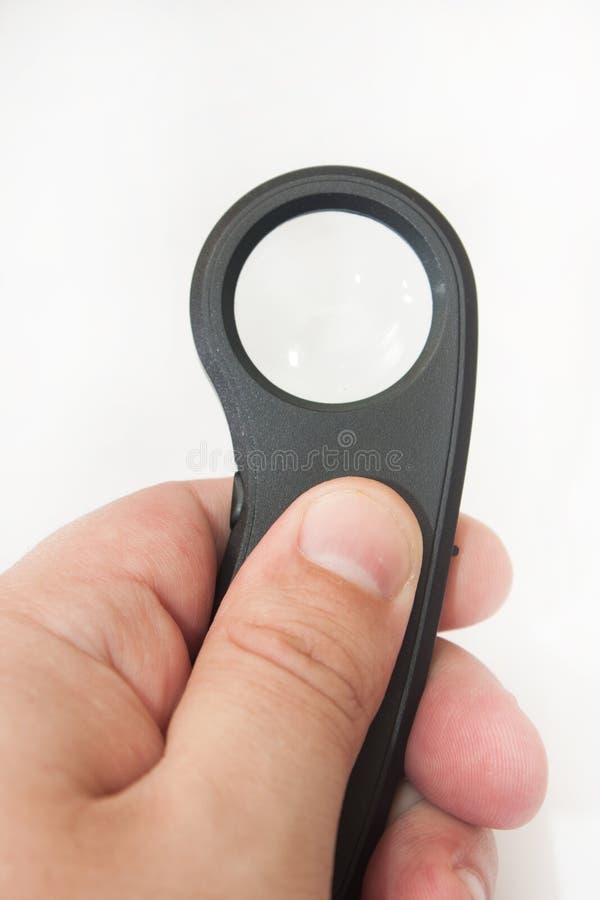 Hand Holding a Pocket Loupe Stock Photo Image of magnifier, circle