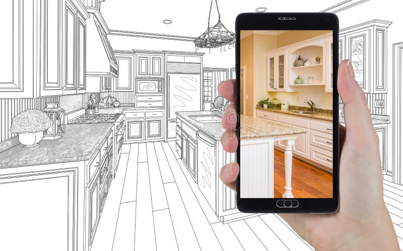 Hand Holding Smart Phone Displaying Photo of Kitchen Drawing Behind. stock images