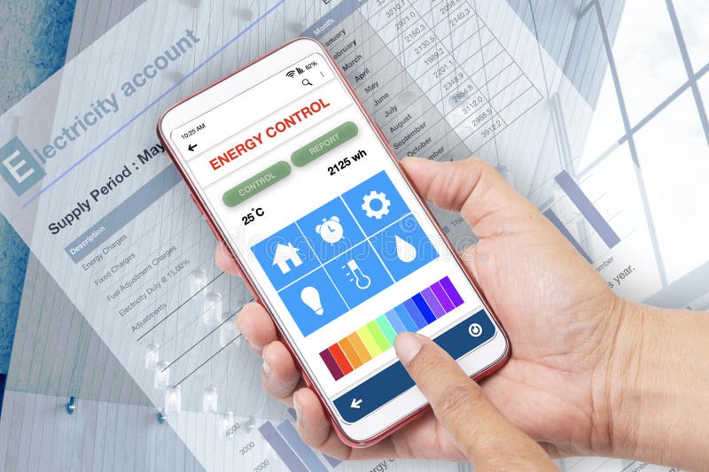 Hand holding smartphone showing energy control application on screen. Someone using energy control application on smartphone to save energy usage