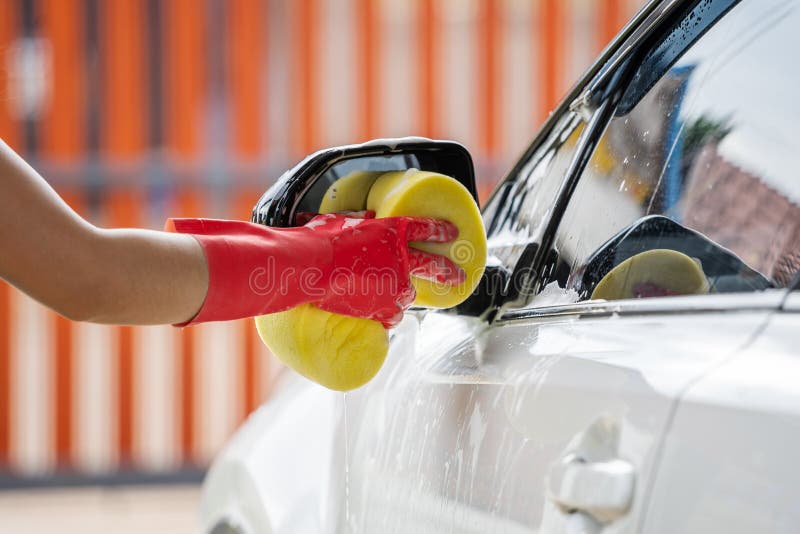 Washing Mirrors in a White Car with Active Foam. Car Wash Stock Photo