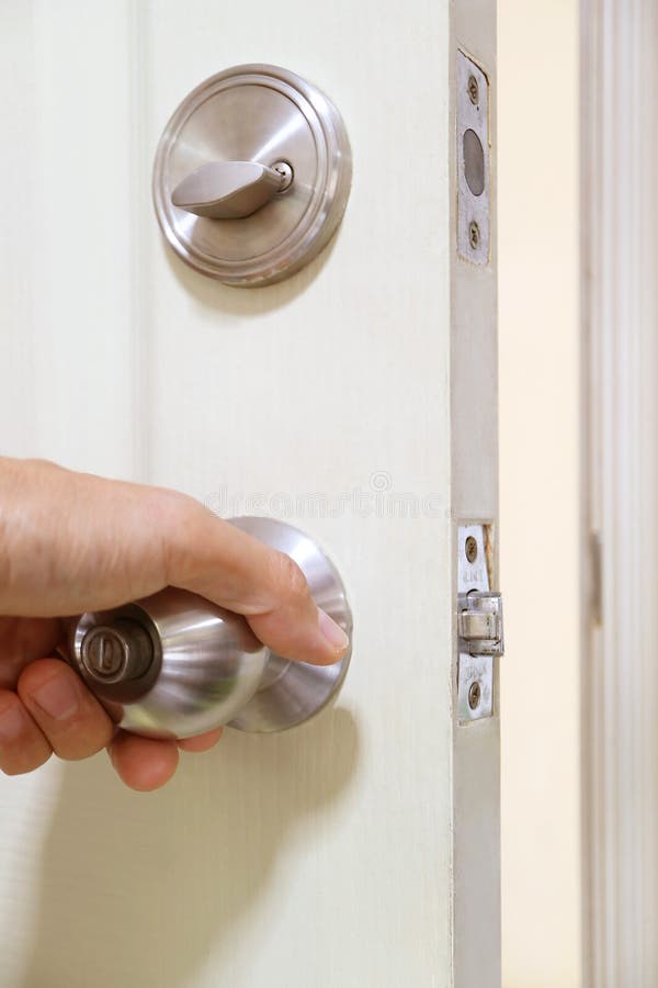 Hand Holding Steel Doorknob for Closing the Door Stock Image Image of