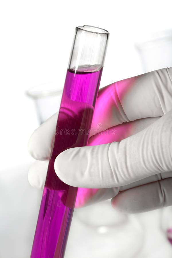 Hand holding test tube isolated