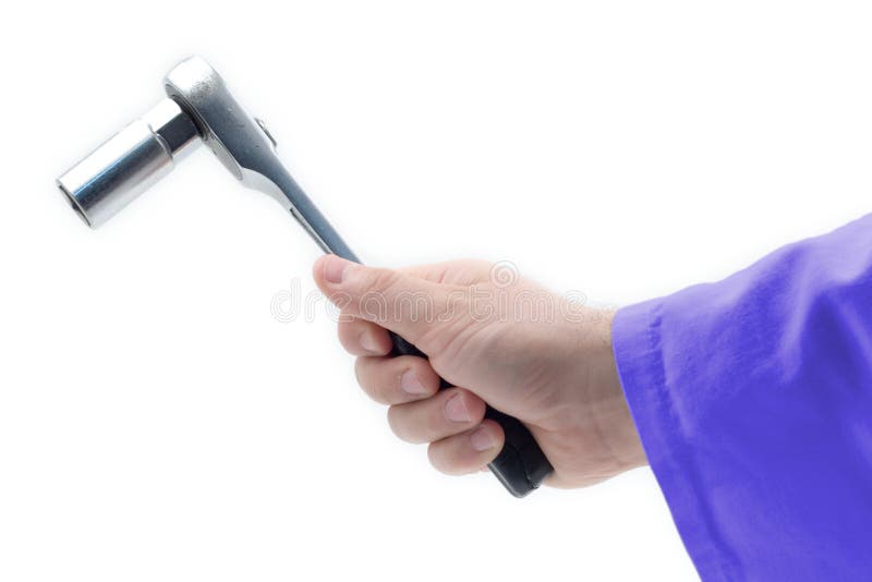 Hand holding a wrench stock photography