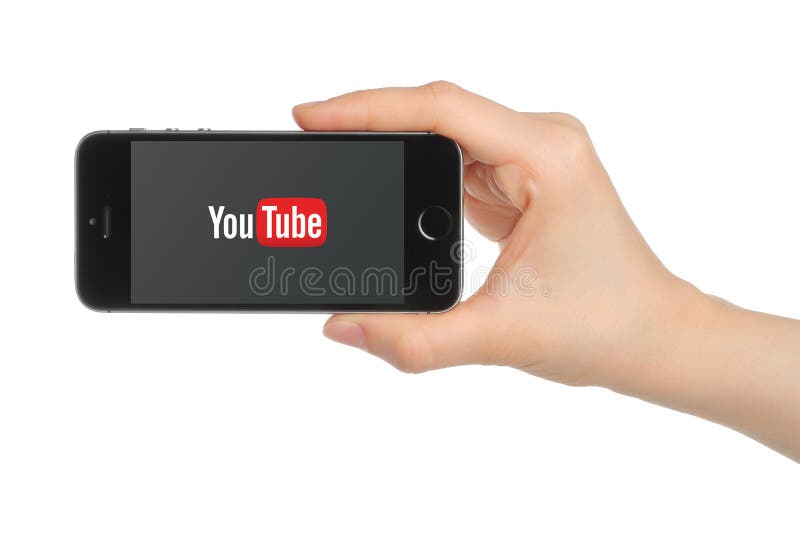 KIEV, UKRAINE - MARCH 7, 2015:Hand holds iPhone 5s Space Gray with YouTube logo on white background. YouTube is a video-sharing website.