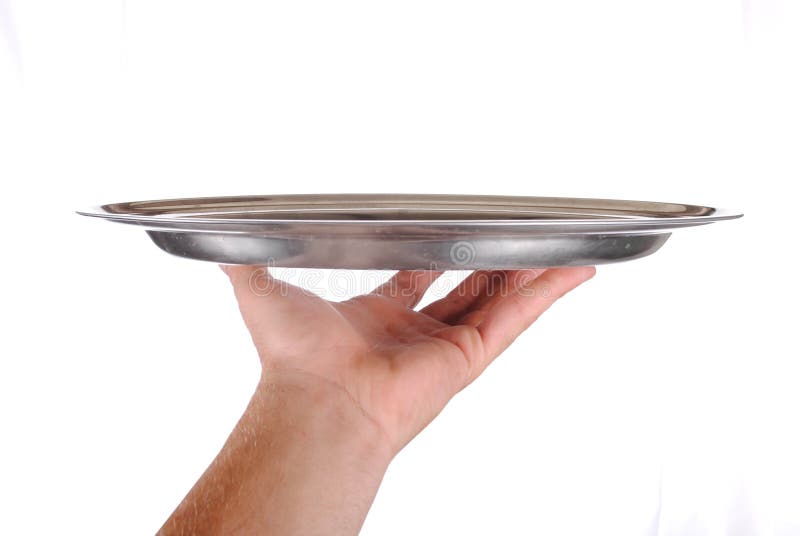 Hand holds a serving tray