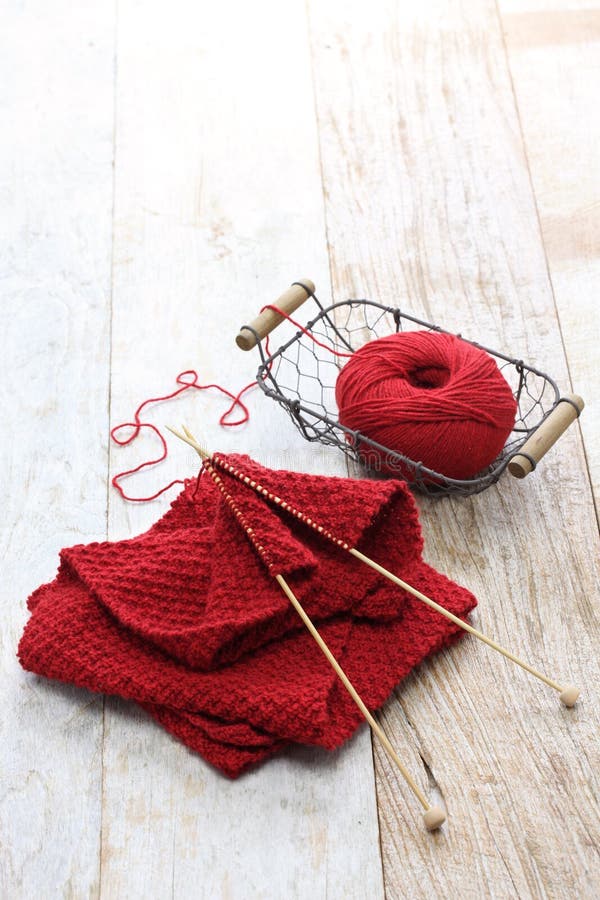 Hand Knitted Red Scarf, Yarn Ball and Knitting Needles Stock Image ...