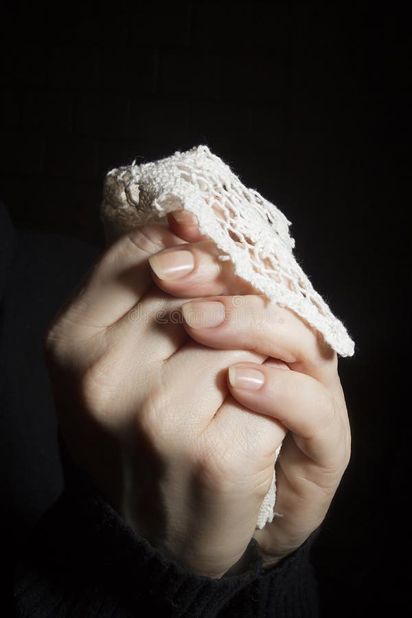 Hand with a lace scarf