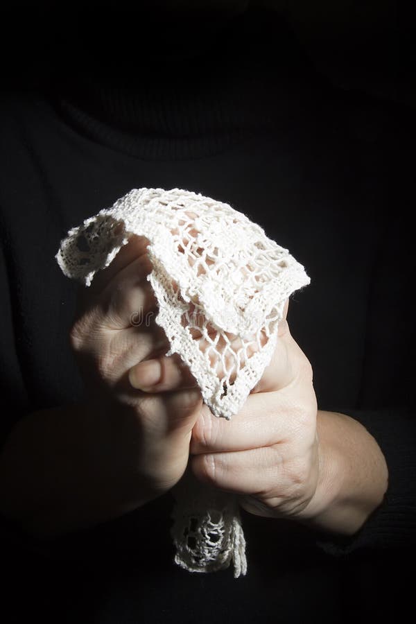 Hand with a lace scarf