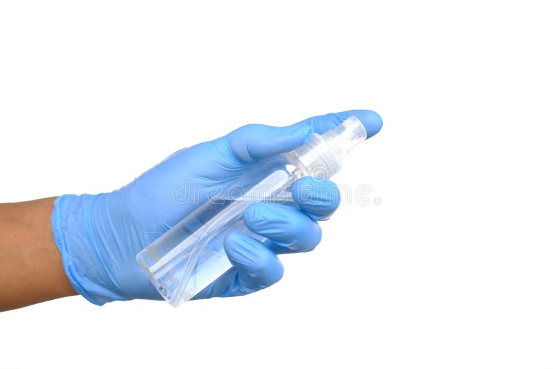 Hand in Latex Gloves Holding Sanitizer Spray on White Stock Image