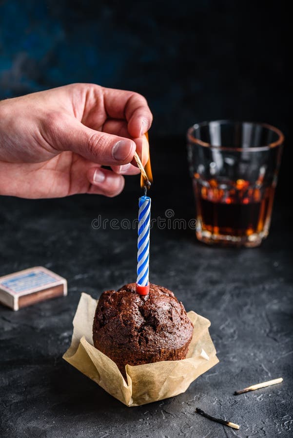 Hand Lighting Candle on Birthday Muffin Stock Image Image of bake