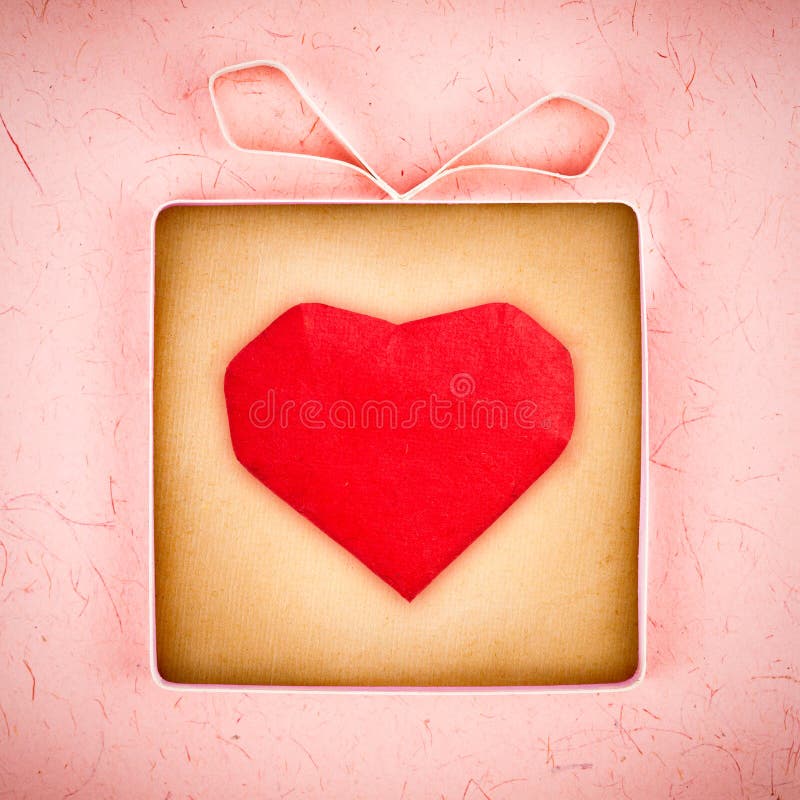 Hand made gift box with heart inside stock images
