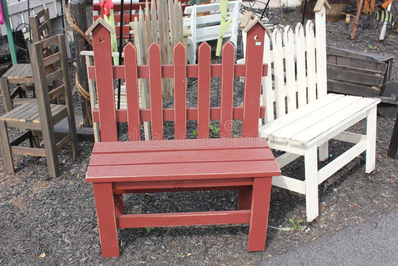 hand made traditional amish wooden benches at amish village stock