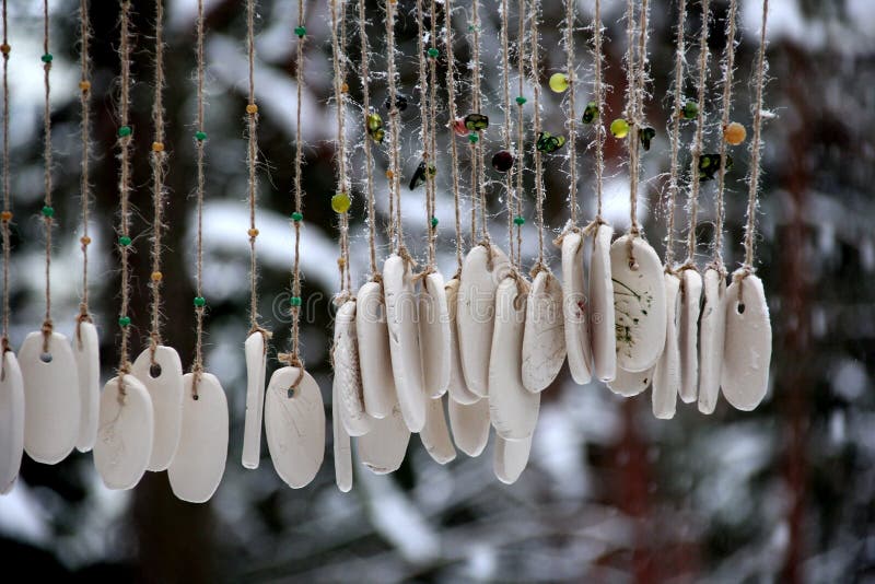 Hand Made Wind Chimes Hanging on a String with Depth of Field Effect Stock  Photo - Image of focus, hand: 210888718