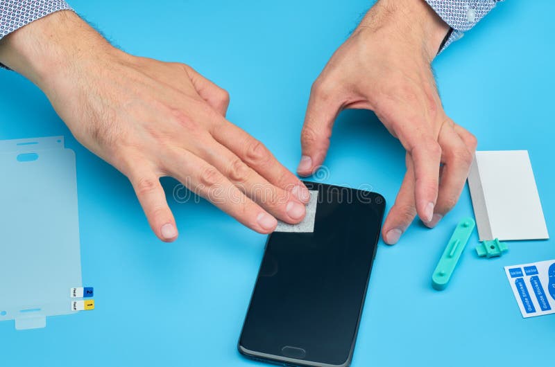 The Man Replacing the Broken Tempered Glass Screen Protector for